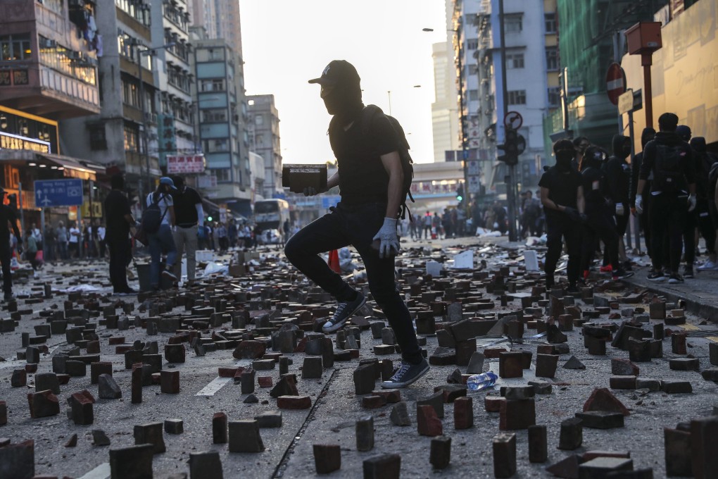 Hong Kong protesters set up roadblocks on Argyle Street in Mong Kok during anti-government demonstrations in November. Photo: Sam Tsang