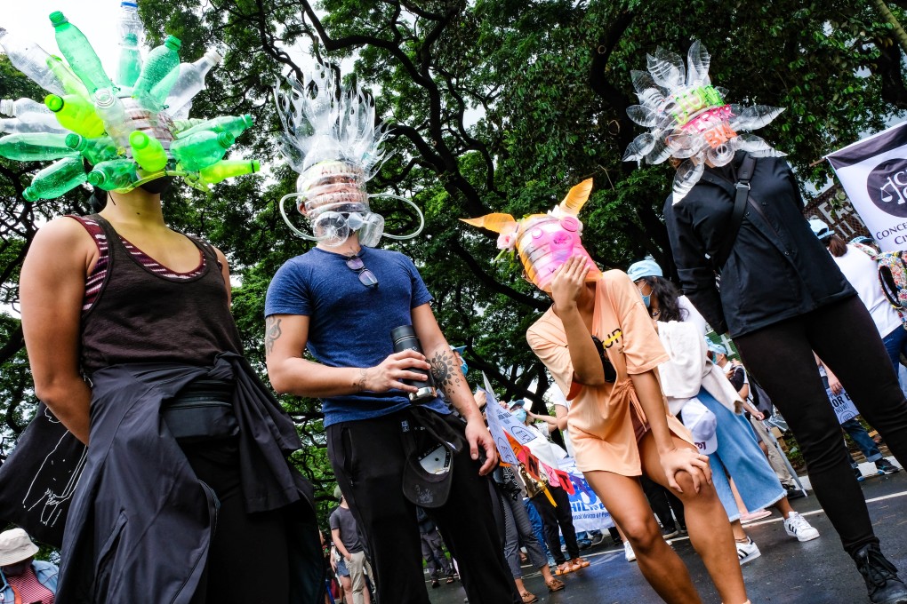 Activists wearing face masks made by visual artist Leeroy New attend a demonstration against the anti-terrorism bill in Manilla, the Philippines. Many Filipino artists believe Philippine President Rodrigo Duterte’s bill is a threat to free speech. Photo: Sheng Dytioco