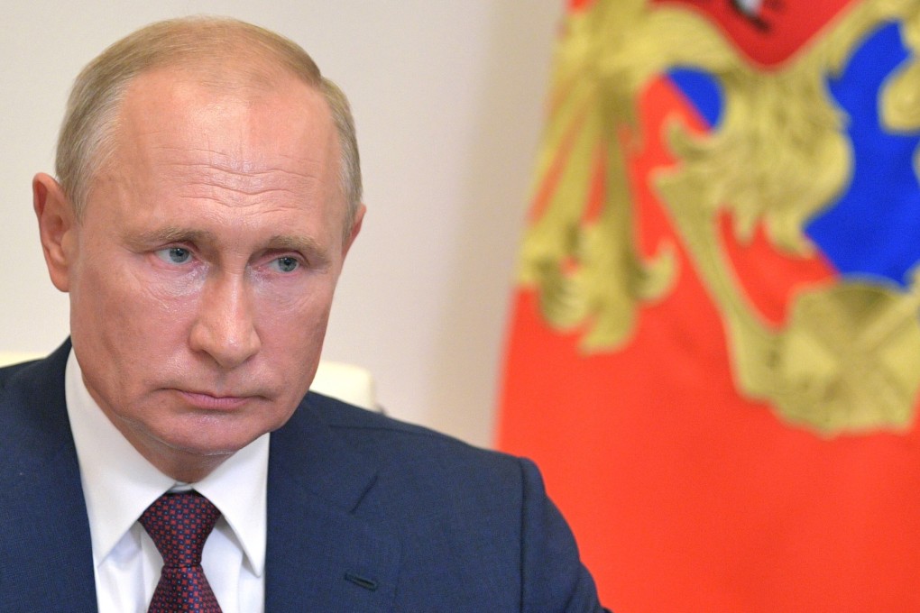 Russian President Vladimir Putin attends a video conference meeting with the working group on amendments to the Russian constitution at the Novo-Ogaryovo residence, outside Moscow, on Friday. Photo: Sputnik via EPA-EFE