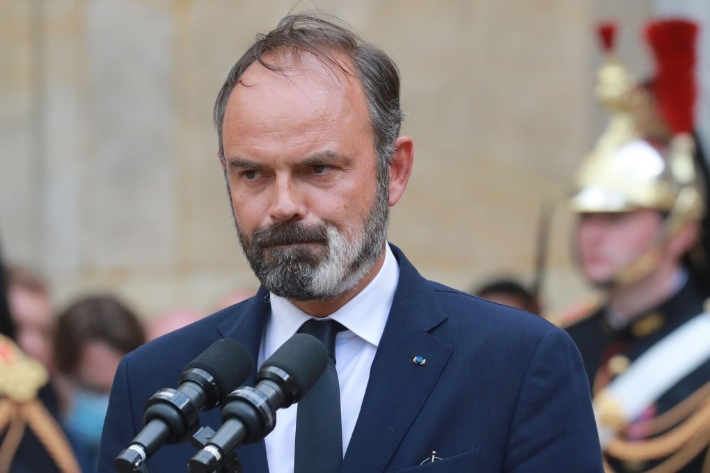 Outgoing French prime minister Edouard Philippe looks on during the handover ceremony in the courtyard of the Matignon Hotel in Paris on Friday. Photo: AFP