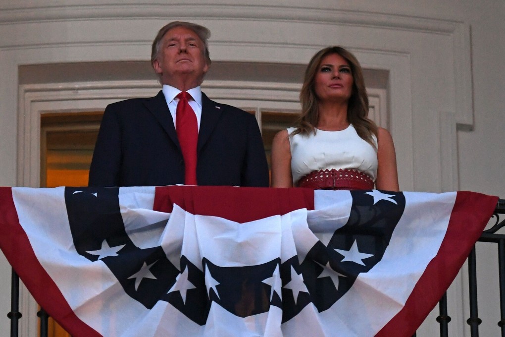 US President Donald Trump and first lady Melania Trump stand in the Truman Balcony at the White House as they host the 2020 ‘Salute to America’ event. Photo: AFP