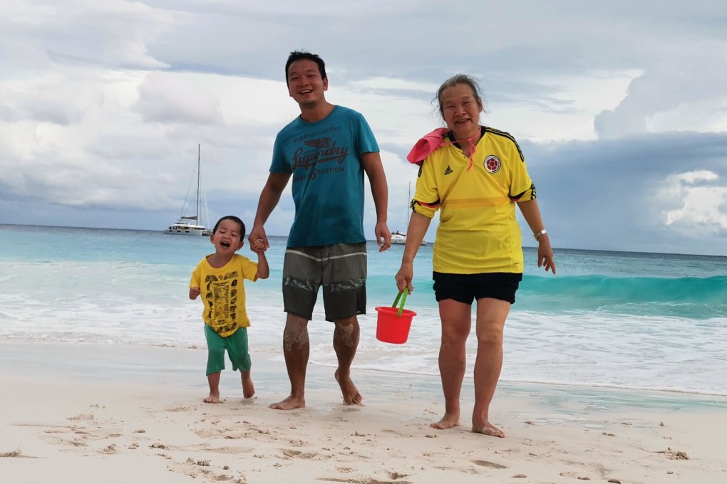 Yang Zhouhu with his mother and nephew on the beach during their extended stay in the Seychelles because of the coronavirus. Photo: Handout