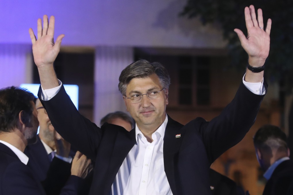 Andrej Plenkovic, Croatia's Prime Minister incumbent celebrates with his party members in Zagreb. Photo: AP Photo