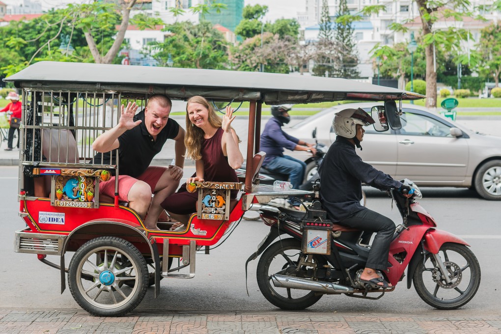 Jennifer Ryder Joslin and Stevo Joslin in Phnom Penh, Cambodia. The teachers, who have been completely nomadic and working online for the past two years, are currently in Malaysia. Photo: Handout