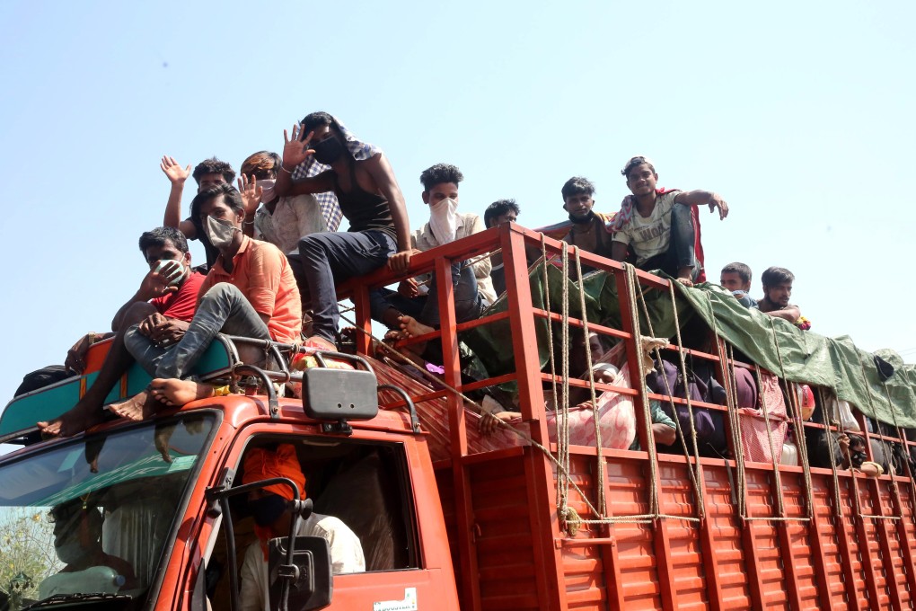 Migrant workers travelling back to their villages near Bhopal, Madhya Pradesh. Photo: EPA