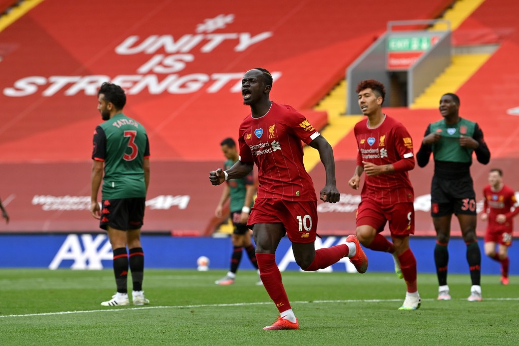 Liverpool’s Sadio Mane celebrates breaking the deadlock against Aston Villa. Photo: DPA