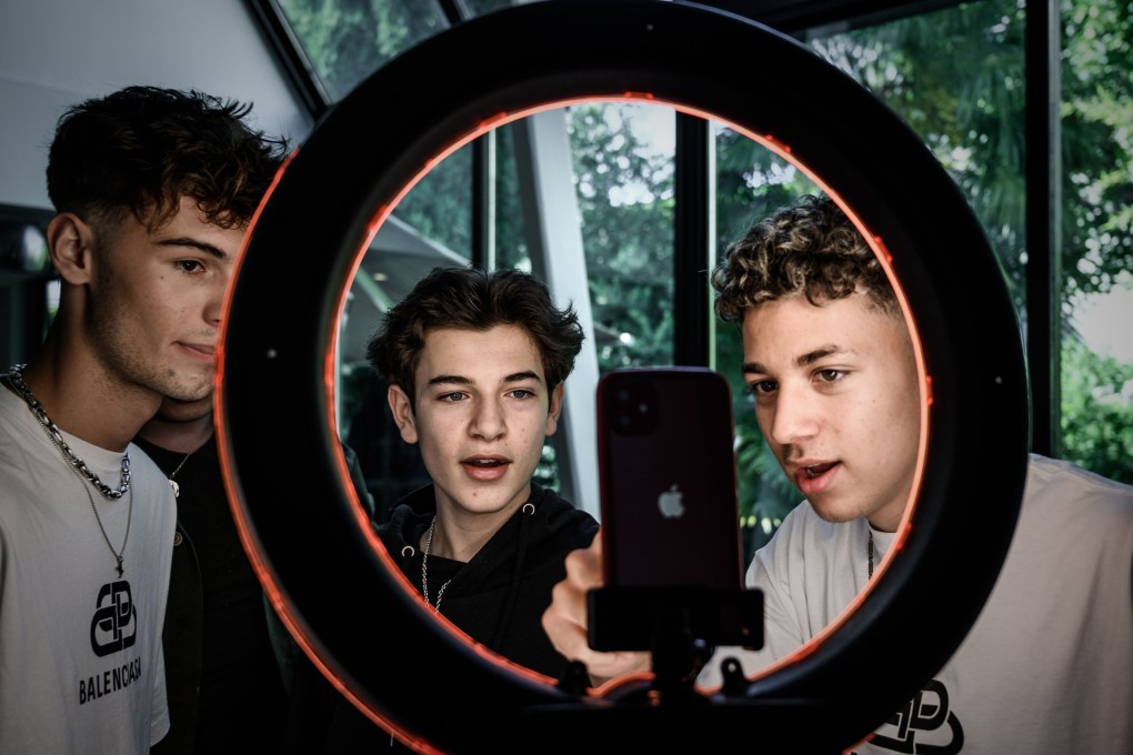 French internet influencers (from left:) Theo Bignonneau @theobignonneau, Sacha Sadok @sacha_sadok, and Rafael Caplan @raf_cpl in Paris. Photo: Philippe Lopez/AFP via Getty Images