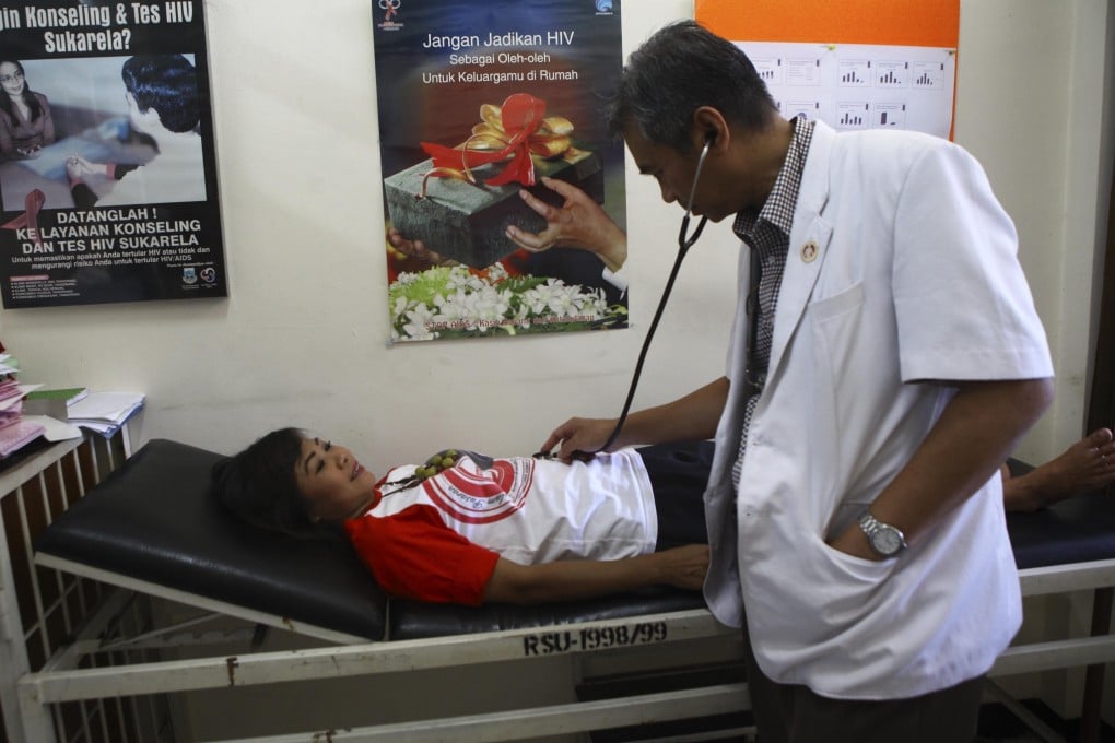 A patient suffering from HIV consults their doctor at Tangerang Hospital, Jakarta, in Indonesia. The coronavirus pandemic could cause an additional half a million Aids deaths if treatment continues to be disrupted. Photo: Getty Images