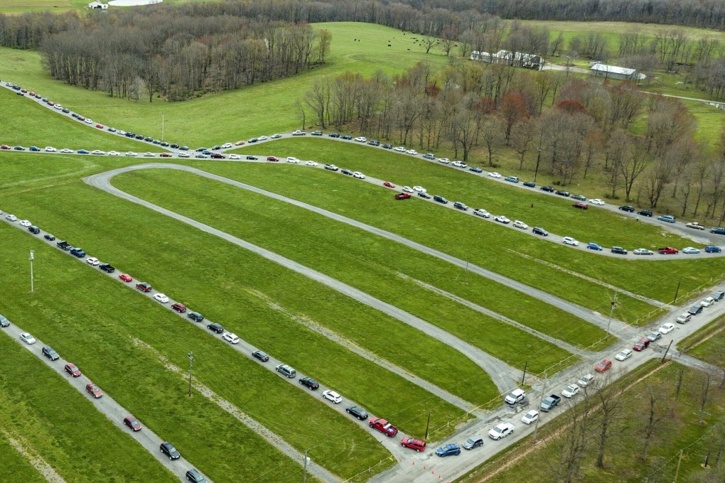 Hundreds of cars wait in line for a food bank distribution at the Big Butler Fairgrounds in Prospect, Pennsylvania, on April 28. The Greater Pittsburgh Community Food Bank expected more than 1,500 vehicles to come to receive two 11kg boxes of food each. Photo: AP