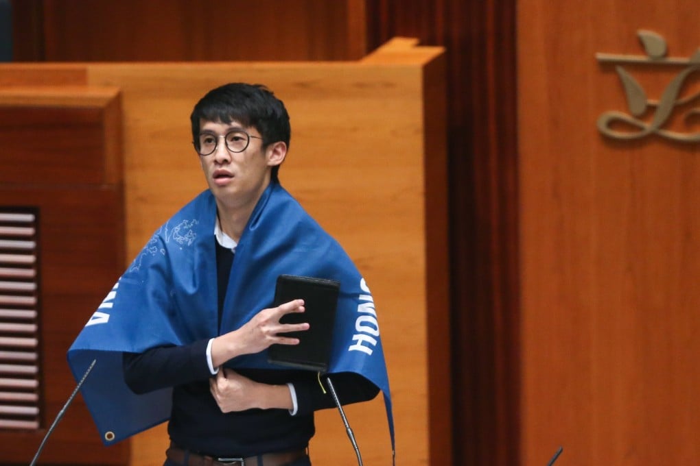 Sixtus Baggio Leung is draped in a banner that read ‘Hong Kong is not China’ during his oath-taking ceremony at Legco. He was subsequently stripped of his seat.Photo: Dickson Lee