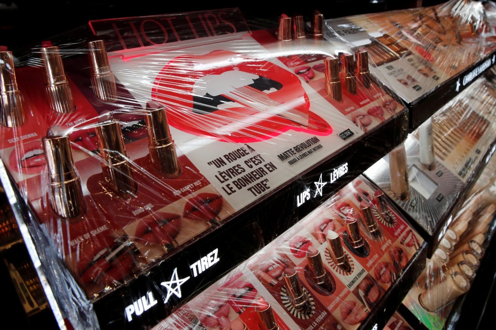 A plastic covers make-up products at a Sephora store in Paris, France. With so much of our face covered by a face mask, can lipstick sales survive the coronavirus? Photo: Reuters