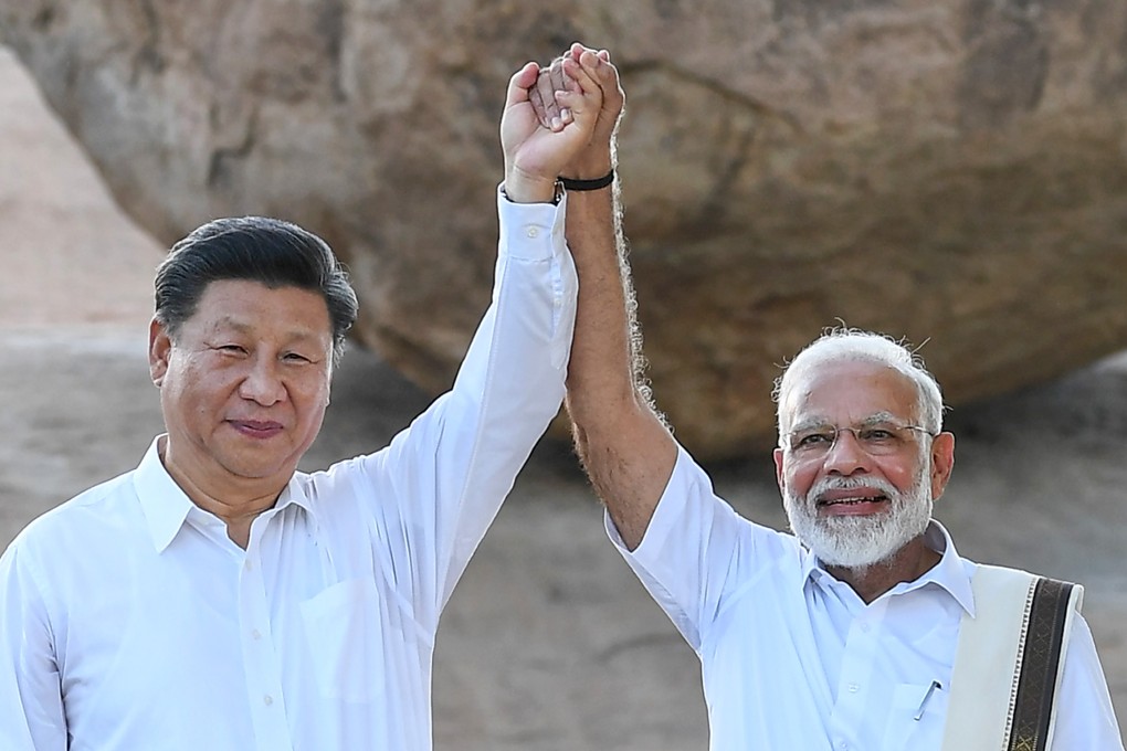 Chinese President Xi Jinping and Indian Prime Minister Narendra Modi show unity last October, but their countries have clashed in recent weeks. Photo: DPA