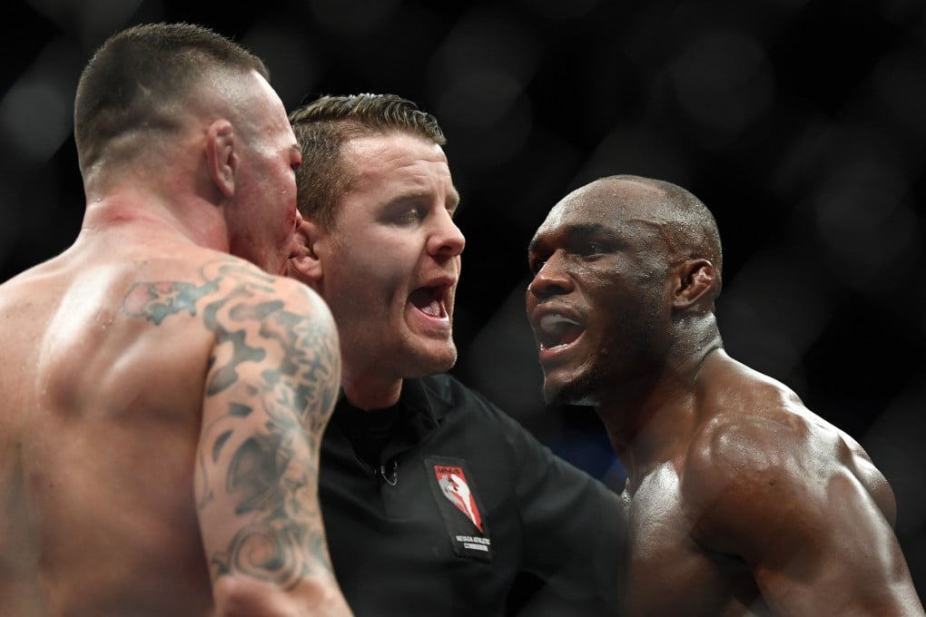 Kamaru Usman and Colby Covington have to be separated by referee Marc Goddard during their welterweight title bout at UFC 245 at T-Mobile Arena, Las Vegas in December 2019. Photo: USA Today