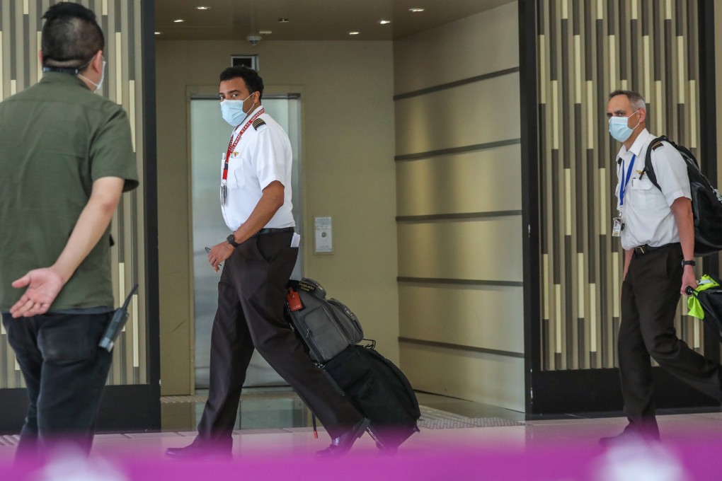 Aircrew leave the testing centre at AsiaWorld-Expo near Hong Kong International Airport. Photo: K. Y. Cheng