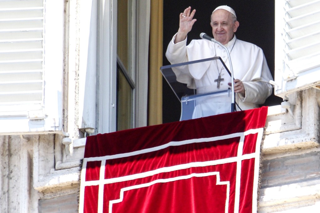 Pope Francis waves from his window overlooking St Peter's Square at the end of the Angelus prayer on Sunday. Photo: AP