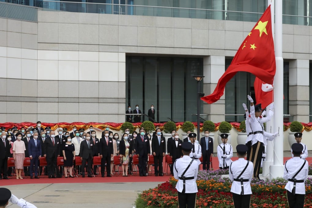 Hong Kong’s top officials and guests attend the flag-raising ceremony for the 23rd anniversary of the establishment of the Hong Kong SAR, at the Golden Bauhinia Square in Wan Chai on July 1. On that day in 1997, the crown colony of Hong Kong officially returned to Chinese sovereignty. Photo: K.Y. Cheng