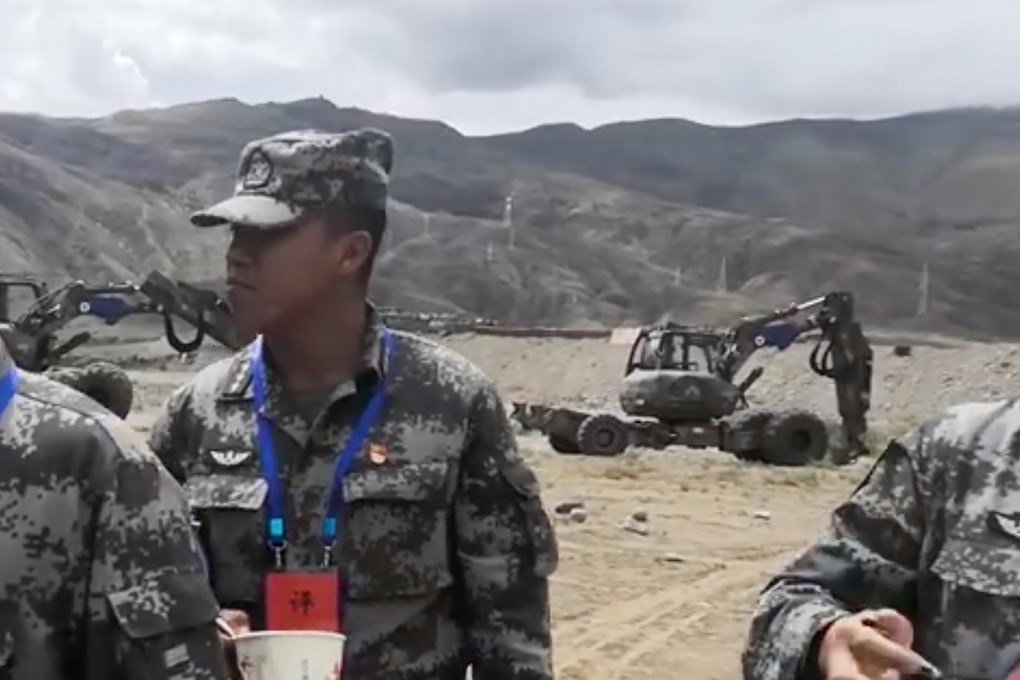 Walking excavators can be seen in the background of a video showing PLA troops on the Tibetan plateau by the Yarlung Tsangpo River. Photo: Handout