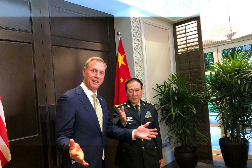 Acting US Secretary of defence Patrick Shanahan (left) meets with Chinese Defence Minister Wei Fenghe on the sidelines of the 18th International Institute for Strategic Studies Shangri-La Dialogue in Singapore on May 31, 2019. Photo: AP
