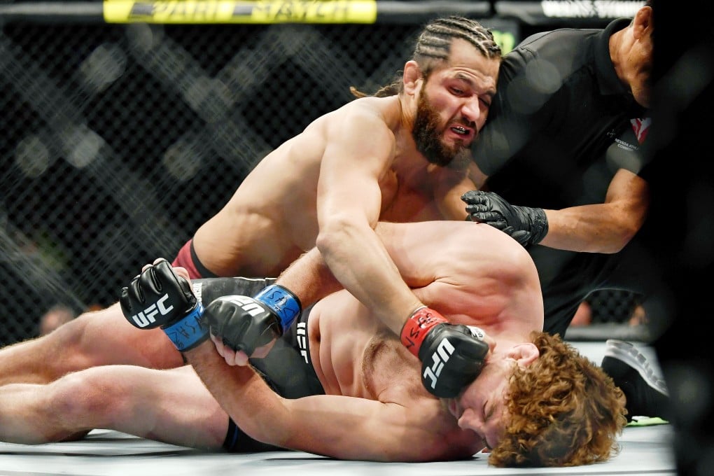 Jorge Masvidal punches Ben Askren as referee Jason Herzog stops the fight at T-Mobile Arena. Photo: USA TODAY Sports