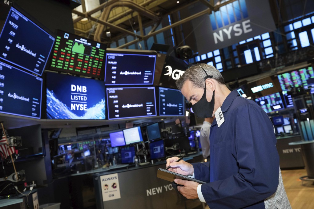 A trader works on the floor of the New York Stock Exchange on July 1. Photo: NYSE via AP