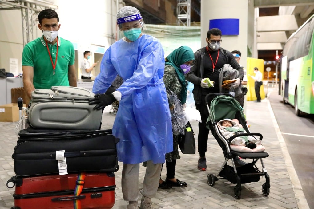 Hong Kong residents travelling from countries deemed high risk by local officials will now be required to produce a negative Covid-19 test before boarding their flights home. Photo: K. Y. Cheng