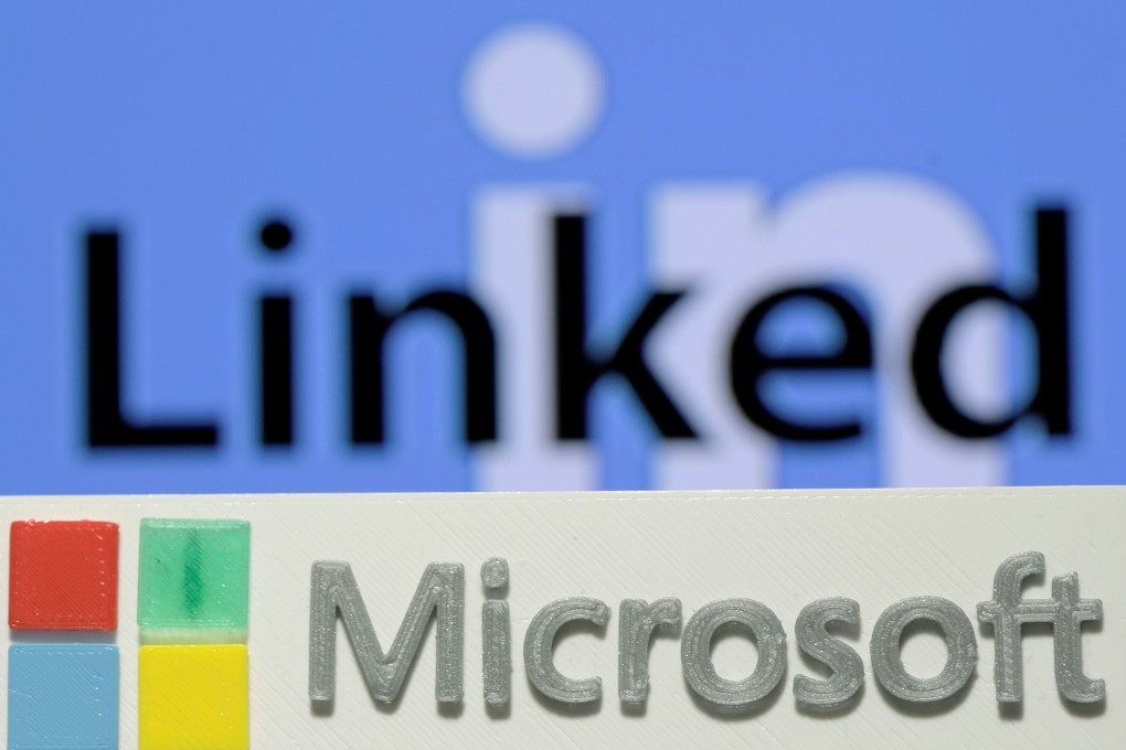 A 3D printed logo for Microsoft is seen in front of a LinkedIn logo. Photo: Reuters