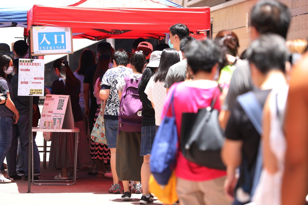 People line up to cast ballots during the opposition camp’s primary in Hong Kong on Saturday. Photo: Dickson Lee