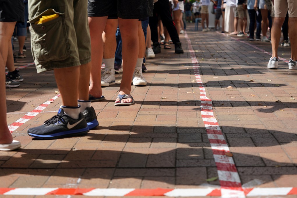 People line up to vote in a primary election on July 12 aimed at selecting pro-democracy candidates for the Legislative Council election in September. Photo: Reuters