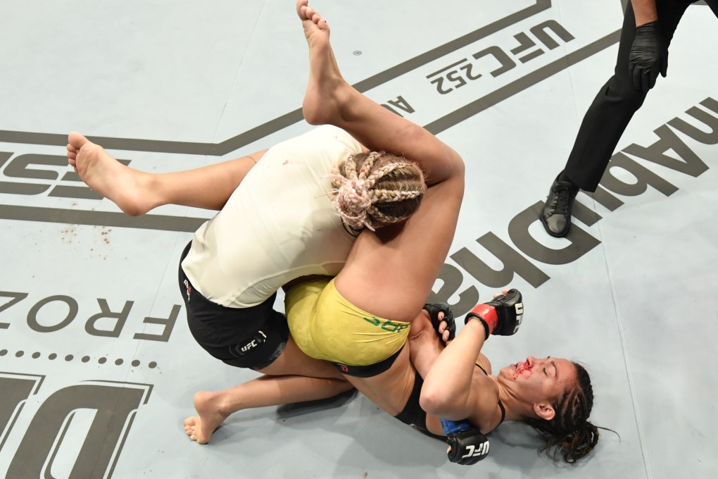 Amanda Ribas secures an armbar submission against Paige VanZant in their flyweight fight during UFC 251. Photo: Jeff Bottari/Zuffa LLC via USA TODAY Sports
