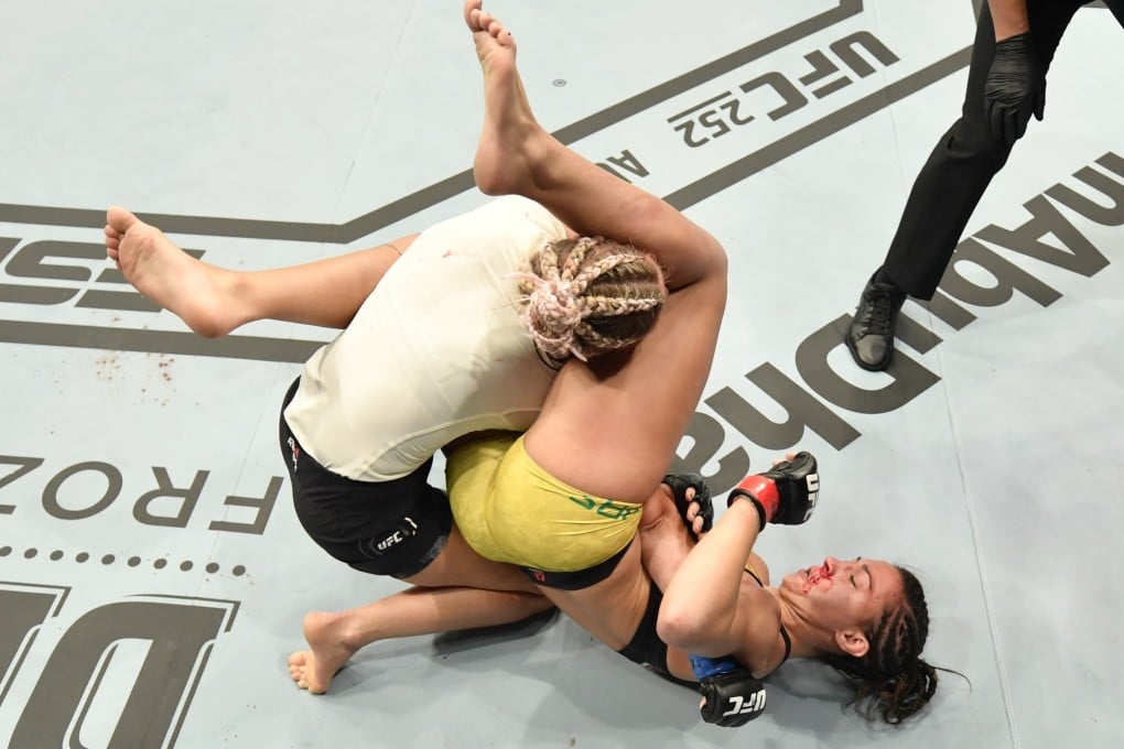 Amanda Ribas secures an armbar submission against Paige VanZant in their flyweight fight during UFC 251. Photo: Jeff Bottari/Zuffa LLC via USA TODAY Sports