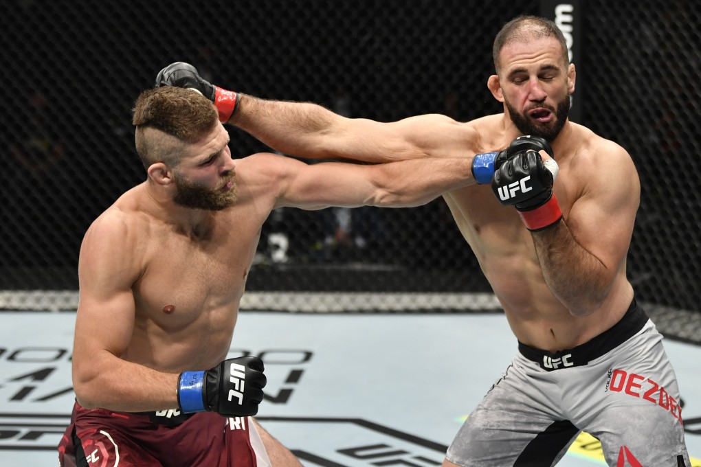 Jiri Prochazka punches Volkan Oezdemir in their light heavyweight fight during UFC 251 on UFC Fight Island in Abu Dhabi. Photo: USA TODAY Sports