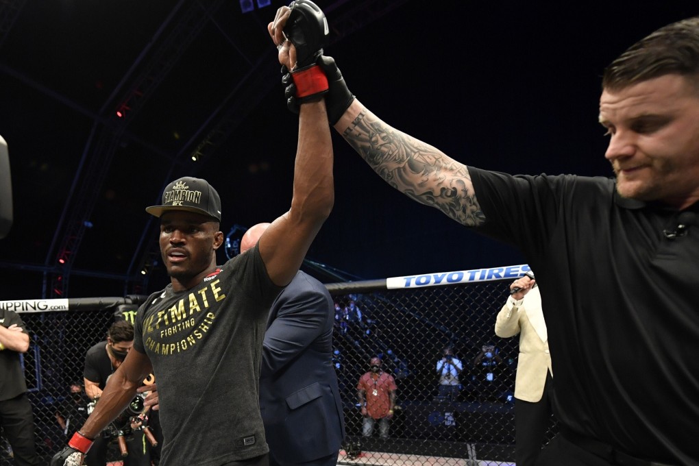 Kamaru Usman celebrates after his victory over Jorge Masvidal in their UFC welterweight championship fight during UFC 251. Photos: Jeff Bottari/Zuffa LLC