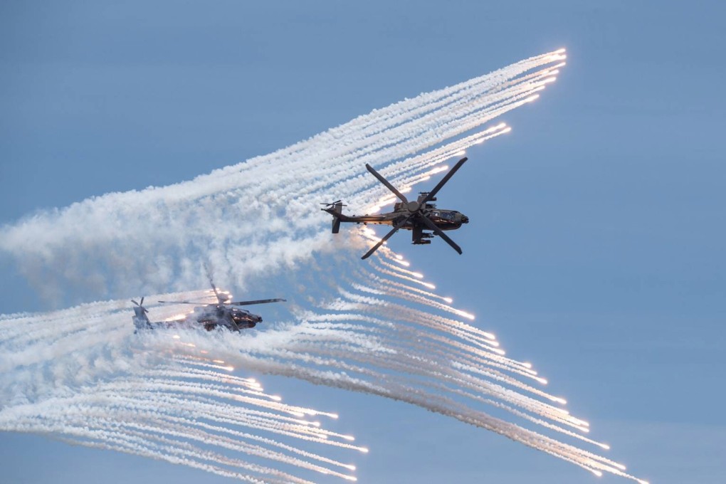 AH-64E Apache helicopters take part in a drill over Taichung on July 2 in preparation for the Han Kuang exercise. Photo: EPA-EFE