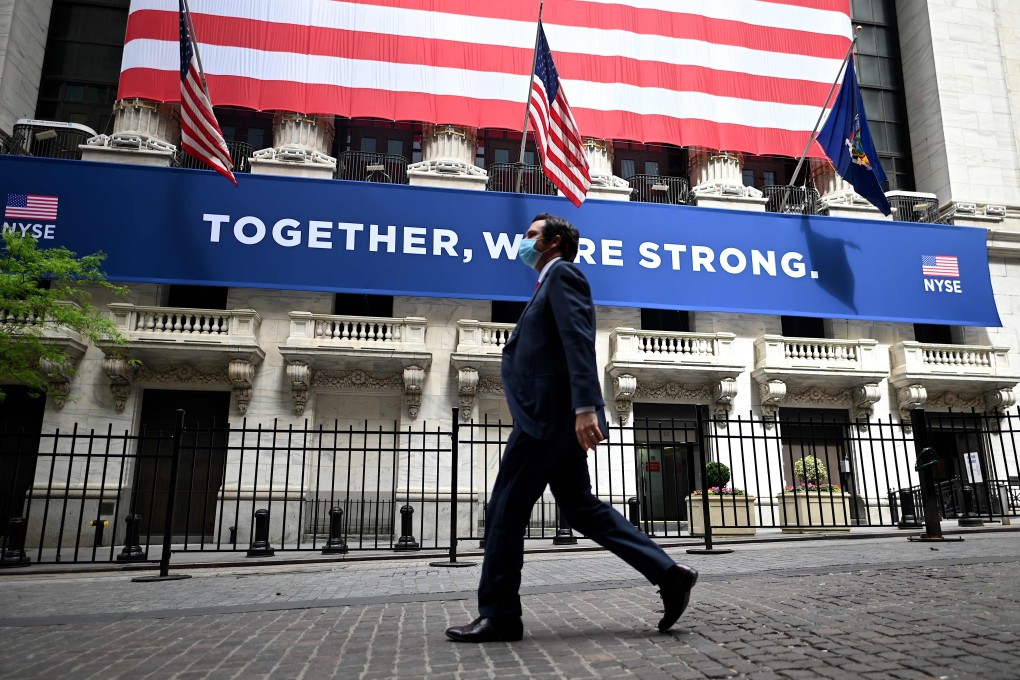 FBI director Christopher Wray says China is actively spying on Fortune 100 companies. Photo: AFP