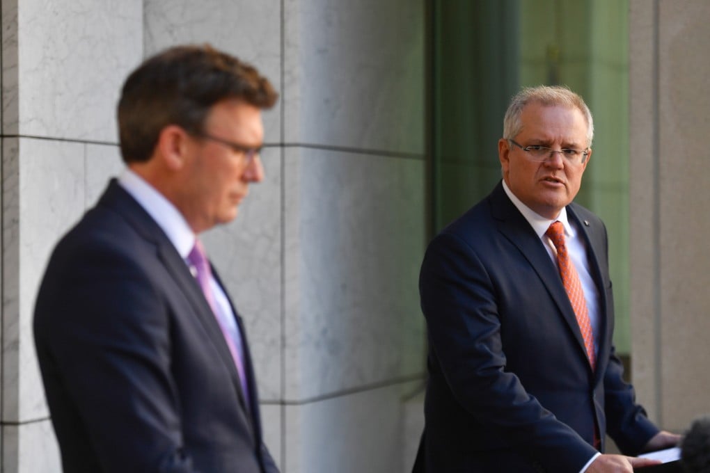 Australia's Prime Minister Scott Morrison (R) and acting Immigration Minister Alan Tudge. Photo: EPA