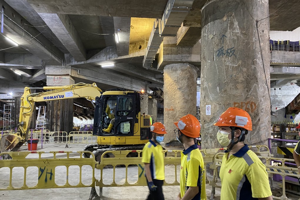 Workers wear smart helmets at Sun Hung Kai Properties’ construction site in Kwun Tong. Photo: Lam Ka-sing