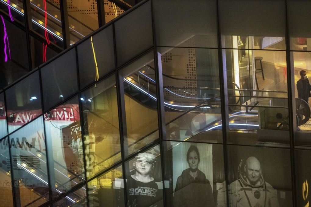 A man walks through an empty shopping mall in Causeway Bay, Hong Kong, during the early weeks of the coronavirus outbreak in the city. Photo: Sun Yeung