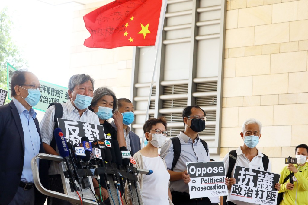 Opposition activists (from left) Yeung Sum, Lee Cheuk-yan, “Long Hair” Leung Kwok-hung, Jimmy Lai, Cyd Ho, Richard Tsoi and Leung Yiu-chung outside West Kowloon Court on Wednesday. Photo: Dickson Lee