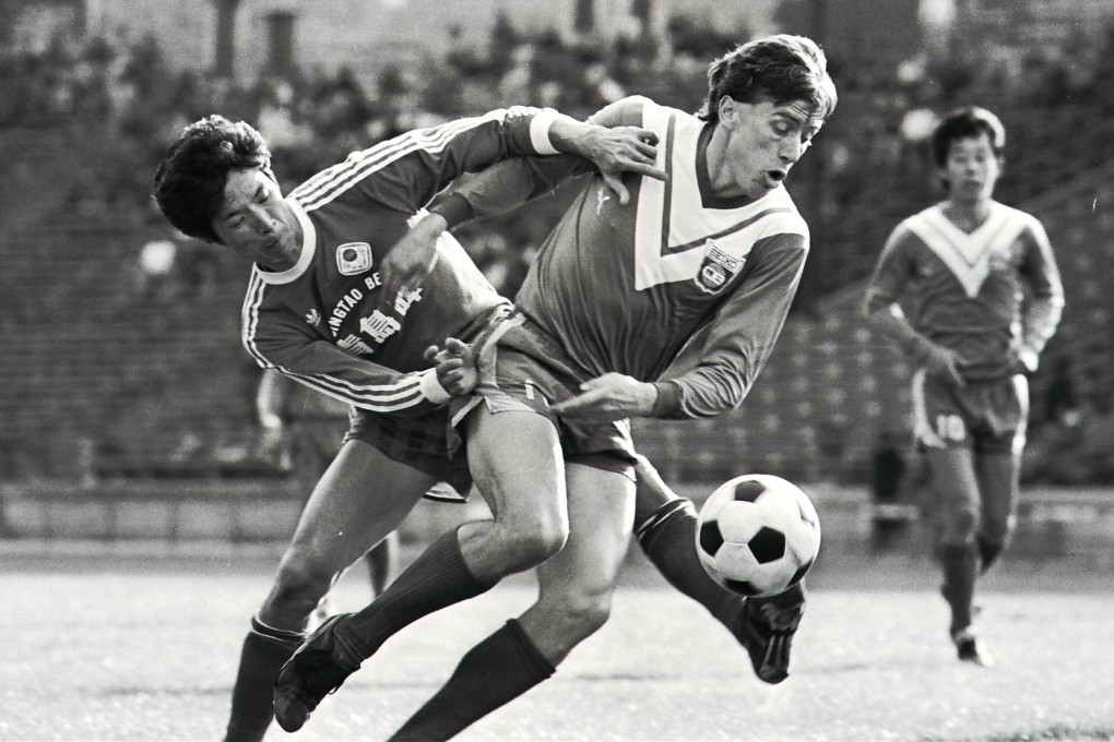 Tony Morley (right) is one of the foreign players who played for Seiko in Hong Kong. The former England international features in a match against Happy Valley in the Super Six Game at Hong Kong Stadium. Photo: SCMP