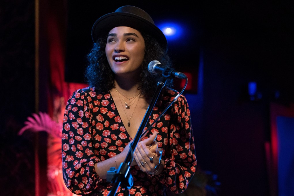 Brittany O’Grady performs in a scene from Little Voice, which is streaming on Apple TV+. The romantic drama series was created by Sara Bareilles after some persuasion from top film director/producer J.J. Abrams. Photo: AP