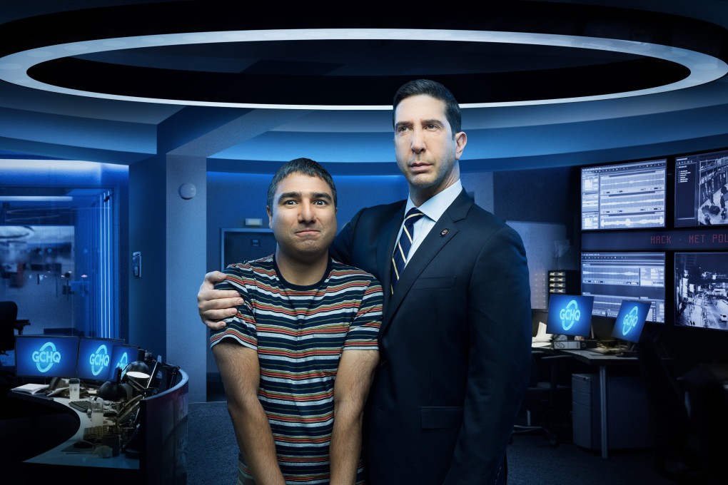 Nick Mohammed (left) and David Schwimmer in a still from the series Intelligence, available on Peacock, the new streaming service from NBCUniversal. Photo: Peacock via AP