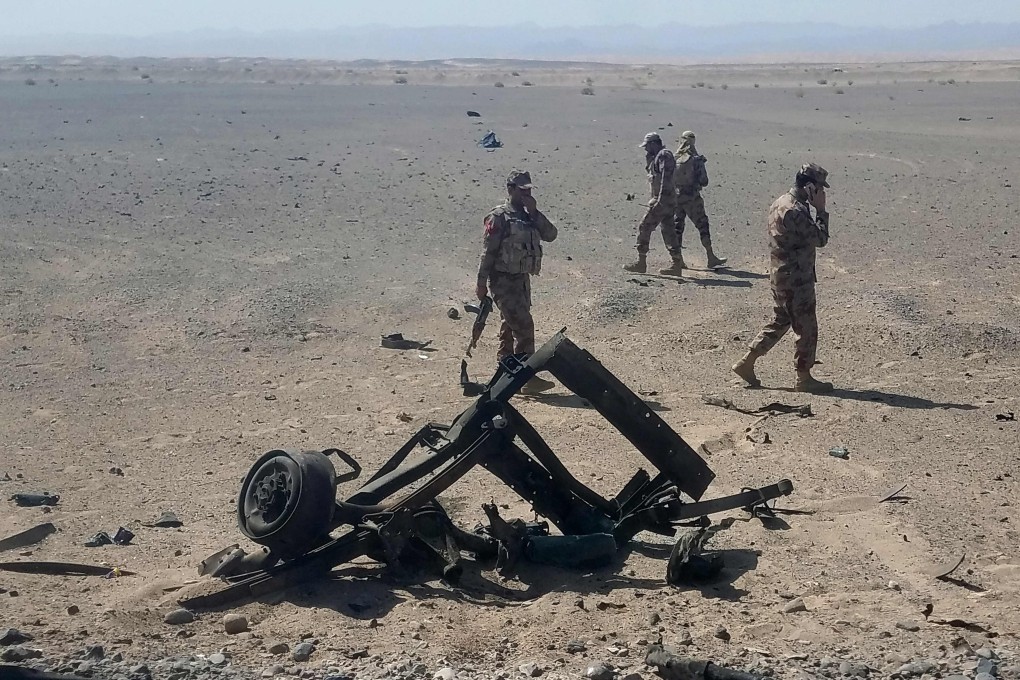 Pakistani security personnel inspect the site of a suicide attack in the Dalbandin region, about 340 kilometres from Quetta, the capital of southwestern Balochistan province. Photo: AFP