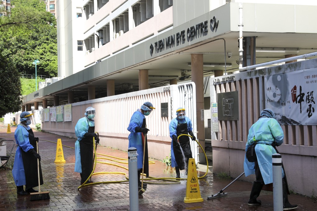 Disinfection works at Tuen Mun Eye Centre, where three members of administration staff were confirmed as infected with the coronavirus on Saturday. Photo: Dickson Lee
