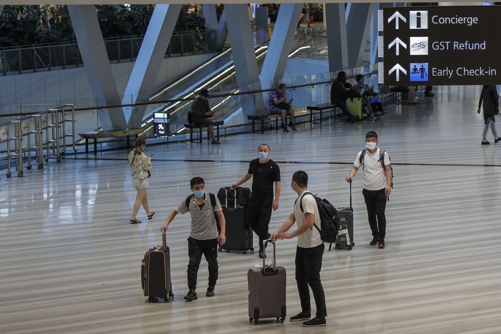 Visitors walk through the Jewel Changi Airport mall in Singapore. Photo: EPA-EFE