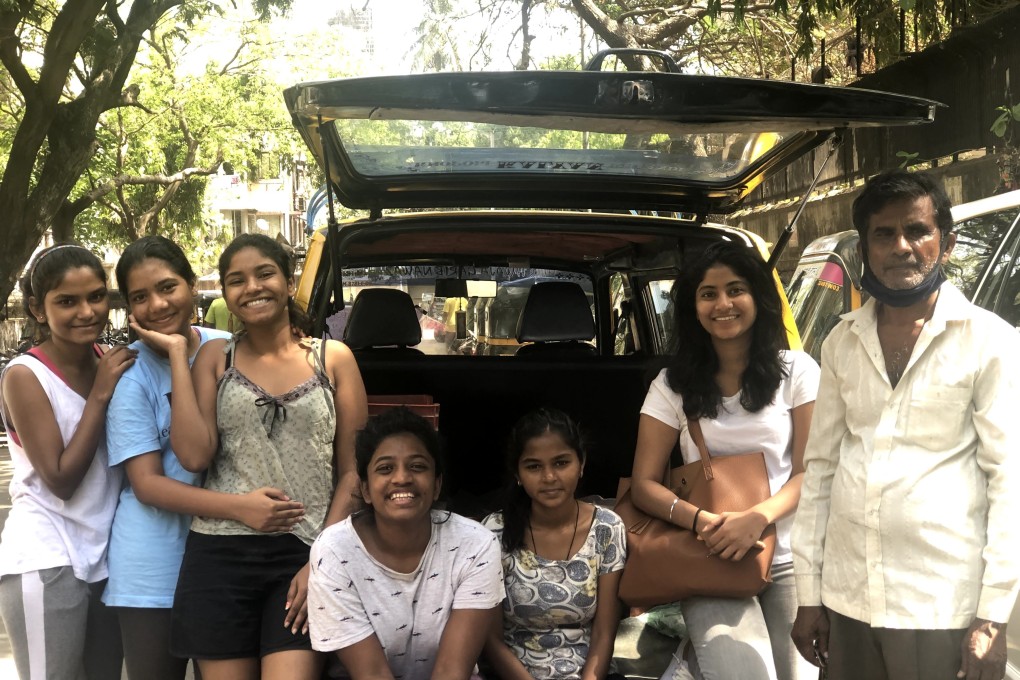 Sandhya Nair (fourth from left) with other krantikaris and the taxi driver who helps them distribute food. Photo: Sandhya Nair