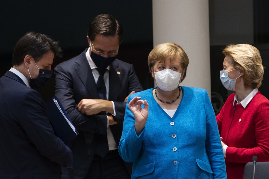 German Chancellor Angela Merkel, second right, speaks with from left, Italy's Prime Minister Giuseppe Conte, Dutch Prime Minister Mark Rutte and European Commission President Ursula von der Leyen. Photo: AP Photo