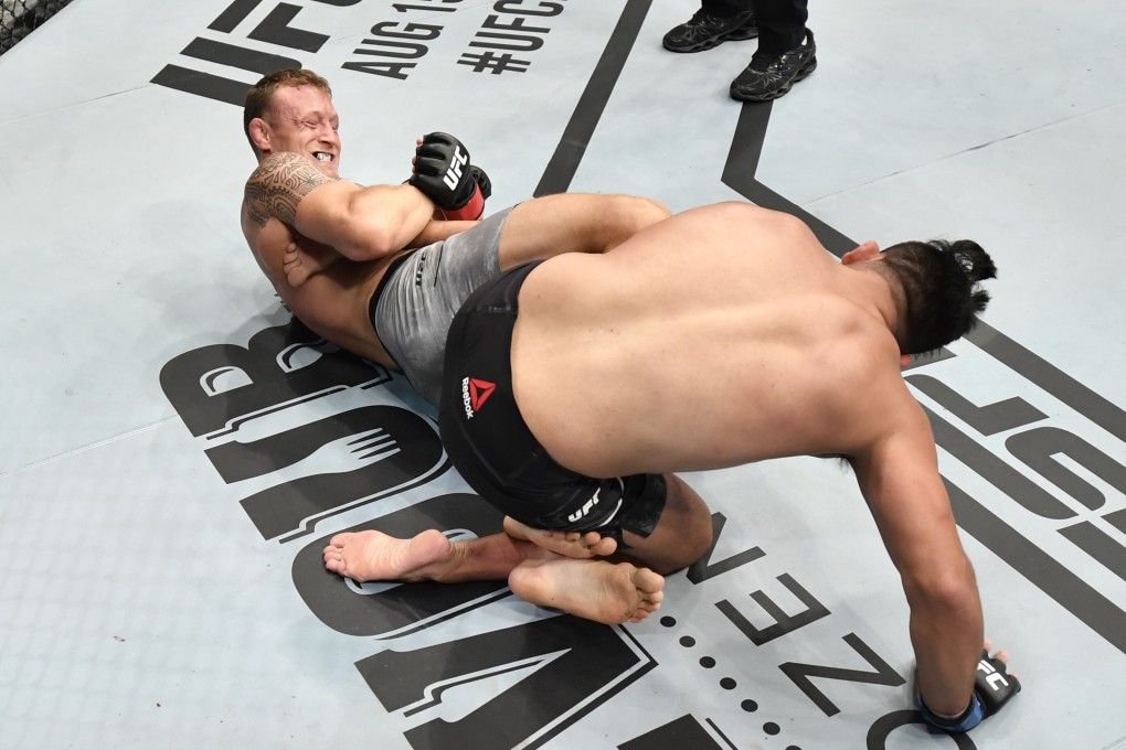 Jack Hermansson secures a heel hook submission against Kelvin Gastelum in their middleweight bout during the UFC Fight Night event inside Flash Forum on UFC Fight Island in Abu Dhabi. Photos: Jeff Bottari/Zuffa LLC via Getty Images
