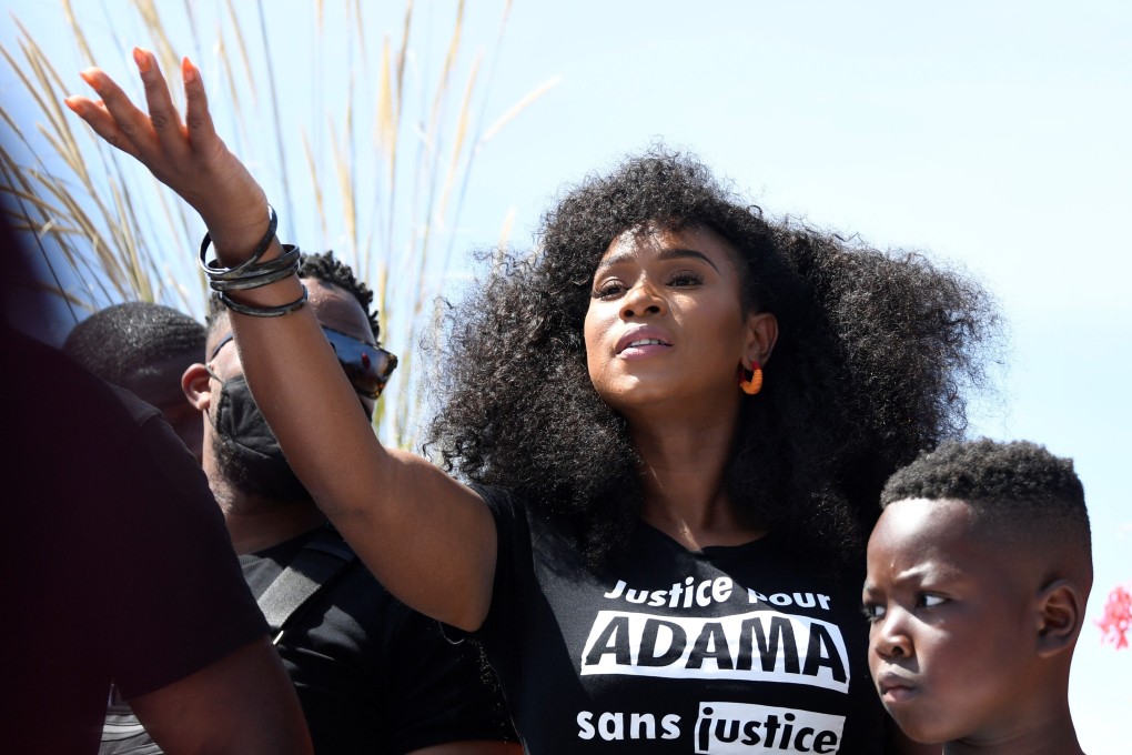 Assa Traore, the sister of late Adama Traore, a man who died in police custody, takes part in a protest march in Beaumont-sur-Oise, outside Paris. Photo: AFP