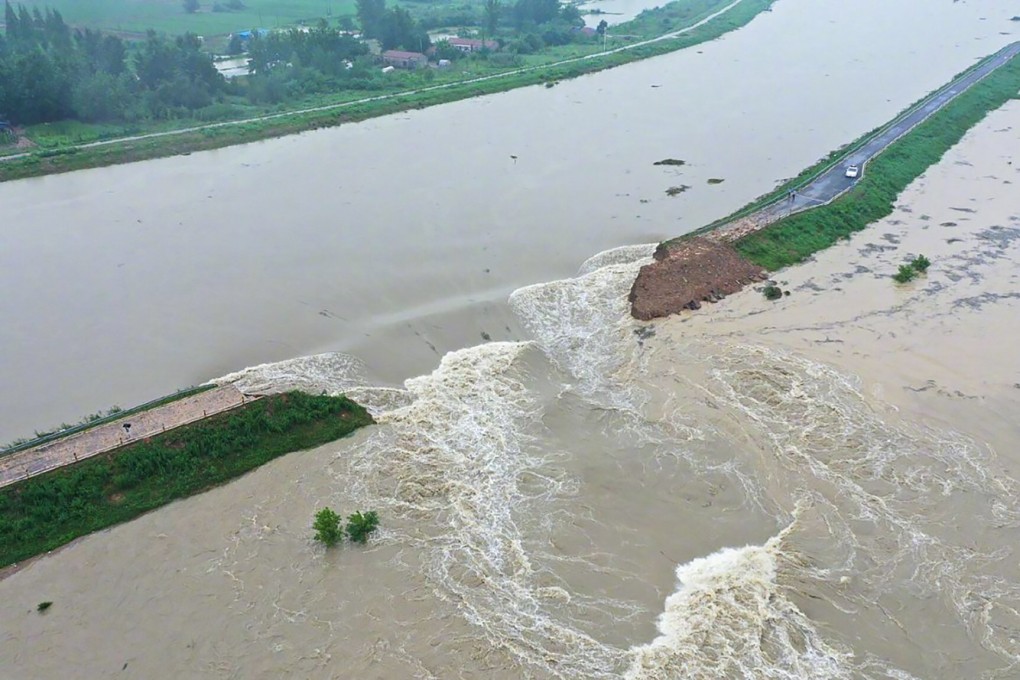 Water flows out of the dam on the Chu River after its demolition. Photo: Handout