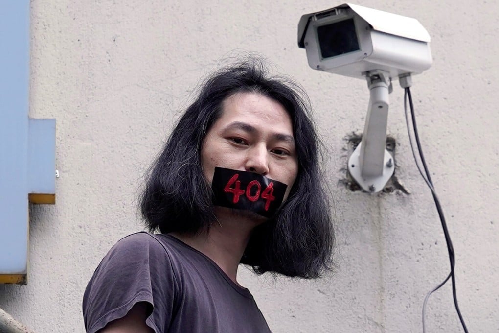 Brother Nut poses in Shanghai with “404” across his taped mouth in a nod to the blocking of online content that is common in China for sensitive issues. Photo: Reuters